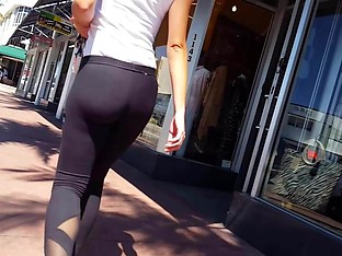 Candid voyeur gorgeous fitness girl walking street, booty