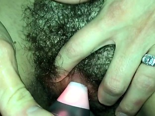 Cumshot on wifes tight hairy pussy while she musturbates